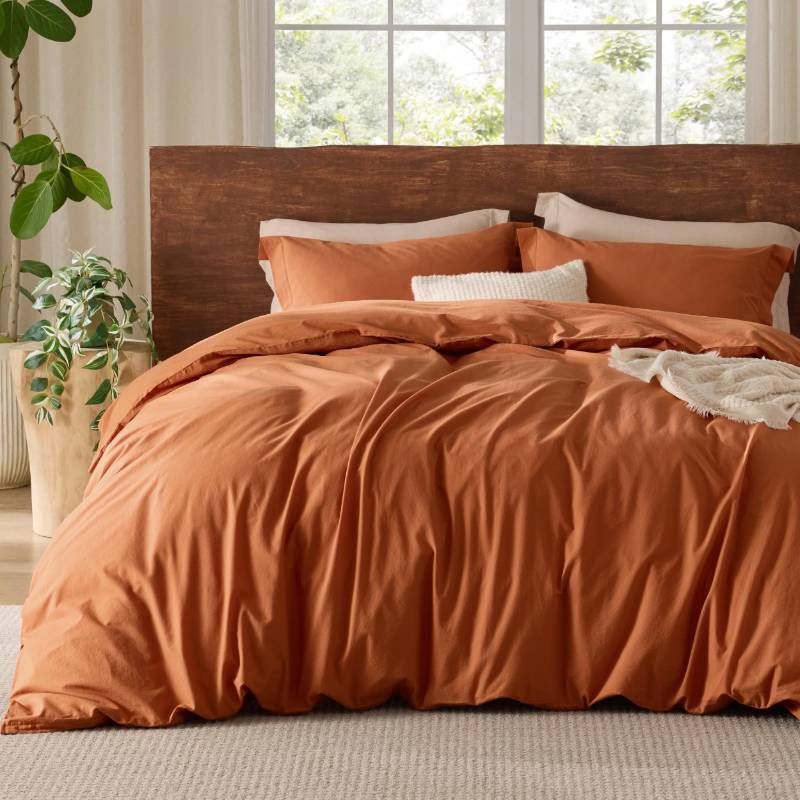 lot 1044 image: Bedsure 100% Washed Cotton Duvet Cover Queen - Pumpkin Orange Minimalist Duvet Cover Set Linen Like - 3 Pieces GentleSoft�� Plain Simple Bedding Set with 2 Pillow Shams (Burnt Orange, Queen, 90x90) Retail $55.99