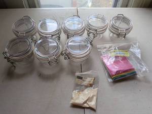 lot 110 image: 8 plastic Hinged Lid Storage Jars with Bramble Berry Colorant Pack