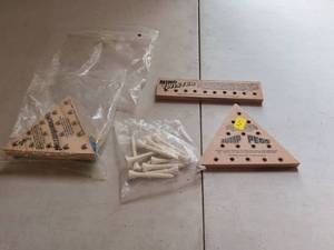 lot 138 image: Mind Twister and Jump Pegs Wooden Puzzle Games Lot