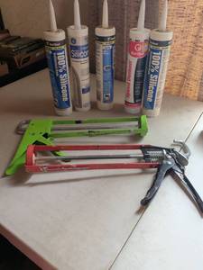 lot 145 image: Caulk Gun and Caulk Cartridge Lot - 2 Guns, 5 Tubes Sealant