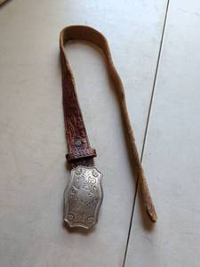 lot 152 image: Tooled Leather Belt with Engraved Silver-Tone Buckle for kids
