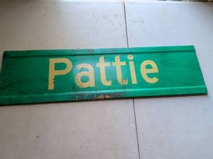 lot 175 image: Pattie Green and Yellow Metal Sign