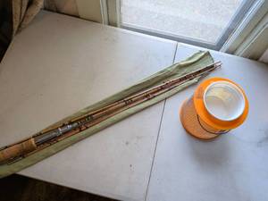 lot 193 image: Fishing Rod with Cork Handle and Orange Mesh Creel Basket