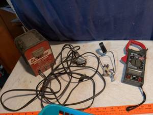 lot 249 image: Schauer Battery Charger Model 5AX612C 612 Volt 4 Amp with CEN-TECH Digital Clamp Meter