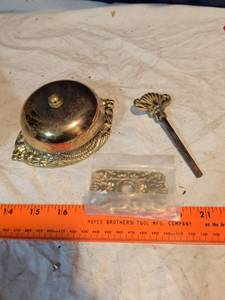 lot 254 image: Vintage ornate brass push- button desk call bells with filigree base