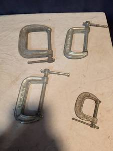 lot 329 image: Adjustable clamps sizes 2 and 12 three of them and another one that is 1