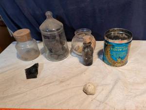lot 365 image: Bostons Tea of Tut Tin with Glass Jars, Bottles, Rocks, Shells and Small Key Lot
