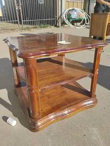 lot 2 image: Wood Coffee table with 2 shelf storage