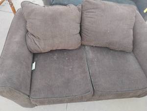 lot 24 image: Light brown love seat