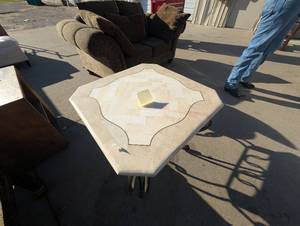 lot 06 image: Coffee table with wrought iron base