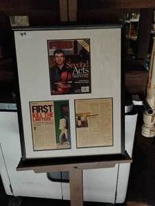 lot 55 image: Framed display of FSB Fortune Small Business, Second acts. Alongside clipped pages from article First Kill the Lawyers