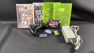 lot 11 image: Assortment of Vintage and Modern Video Games and Wii Power Adapter