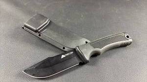 lot 15 image: Ozark Trail Fixed Blade Knife Approximately 4 Inch Blade,  Scabbard with Belt Clip