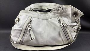lot 33 image: B. Makowsky White Leather Shoulder Bag with Dual Zip Pockets and Magnetic Close