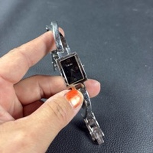 lot 47 image: DKNY Womens Bangle Wristwatch with Rectangular Black Dial