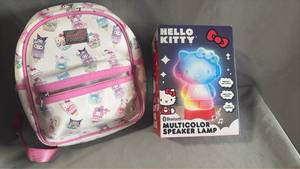 lot 57 image: Hello Kitty Backpack and Light