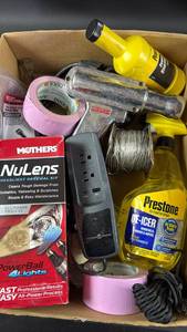 lot 157 image: Automotive Supplies Lot Duck Tape Cable Ties Headlight Kit Ice Melt Spray and Timing Light