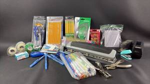 lot 168 image: Office Supply Lot Pencils, Tape, Protractor, Erasers, Stapler, Scissors, Markers and Three Hold Punch