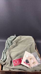 lot 212 image: Military Insignia and 2) Olive Drab Drawstring Bags Approximate Dimensions 23 Inches Wide and 28 Inches Long