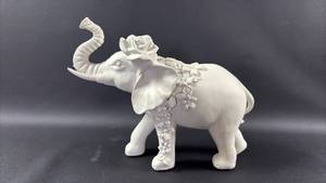 lot 229 image: White Elephant Figurine with Rose and Floral Garland Decorative Sculpture Super Smooth Poly Clay