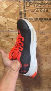 lot 302 image: Size 7 Under Armour & Size 8.5 Pumas