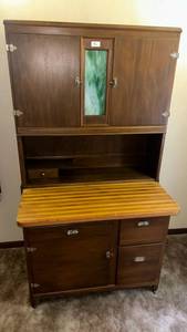 lot 56 image: Two-Piece  Hoosier style Wooden Cabinet  with Metal Insert and Glass Door, bread drawer