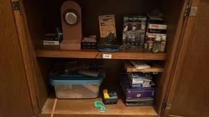 lot 103 image: Mixed Electronics & Media Lot �� Polaroid Film, GE 2.4GHz Answering System, Sony Camcorder, VHS, More