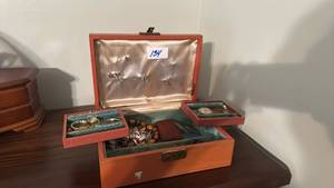 lot 134 image: Orange Jewelry Box with Multiple Compartments and Contents