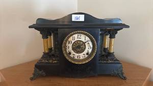 lot 161 image: Mantel Clock with Columns and Brass Ornament Dial