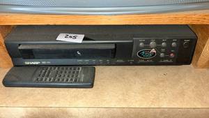 lot 205 image: Sharp VHS HQ VCR with Multi Language CASD Remote