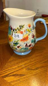 lot 212 image: Ceramic Pitcher with Floral Design Blue Handle