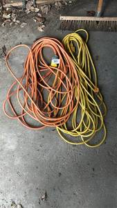 lot 247 image: Extension Cords Lot Orange and Yellow 2 Pack