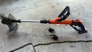 lot 252 image: BlackDecker Cordless String Trimmer with Charger