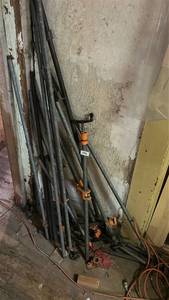 lot 296 image: Pipe Clamps with Bar Lot �� Multiple Units with Orange Clamp Heads