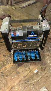 lot 298 image: Delta 12 12 Portable Planer with Knives