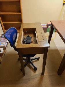 lot 906 image: Sewing Cabinet with footed and office chair, no sewing machine 30x36x18 located in basement