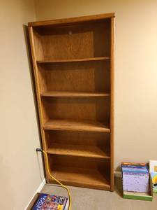 lot 907 image: Bookshelf 72x32x10 screwed  to wall bring tools to remove located in basement