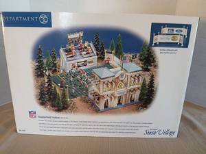 lot 1009 image: Department 56 Snow Village Champsfield Stadium NFL Set of 24