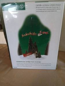 lot 1021 image: Department 56 Animated Reindeer and Sleigh Santas On His Way #56.52502