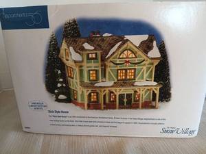 lot 1026 image: Department 56 The Original Snow Village Stick Style House #54943