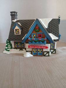 lot 1030 image: The Original Snow Village Department  56 Skate and Ski Shop Lighted Holiday Decoration House