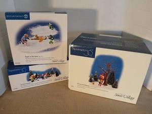lot 1039 image: Department 56 Snow Village Figurine Set Lot  Fun at the Firehouse. Fire man to the rescue, and Amgels in the Snow