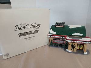 lot 1060 image: The Original Snow Village Rollerama Roller Rink Handpainted Ceramic