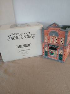 lot 1063 image: The Original Snow Village Apothecary Handpainted Ceramic Building 5076-8