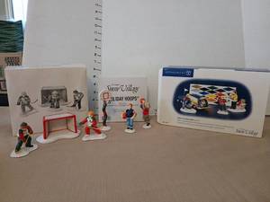 lot 1244 image: The Original Snow Village Handpainted Ceramic Accessories Lot Holiday Hoops Cold Weather Sports and Before the big Game