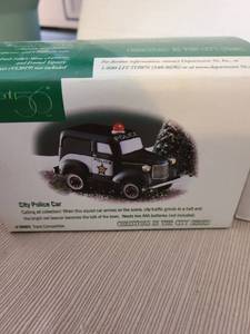lot 1246 image: Department 56 Christmas in the City Series Porcelain Vehicle Lot