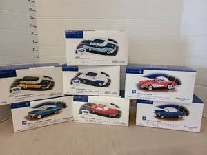 lot 1255 image: Lot of 7 Department 56 Snow Village Classic Car Figurines 1950s Ford Chevrolet