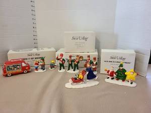 lot 1257 image: Snow Village Handpainted Ceramic Accessory Lot 5170-5 Check It Out Bookmobile Skate Faster Mom Were Going to a Christmas Pageant