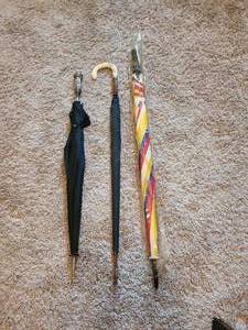 lot 1267 image: Lot of 3 Umbrellas with Decorative Handles