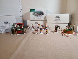 lot 1307 image: Heritage Village Collection North Pole Series Christmas Figurines  including Untangle the Christmas  Lights no ac adapter does have area for C batteries